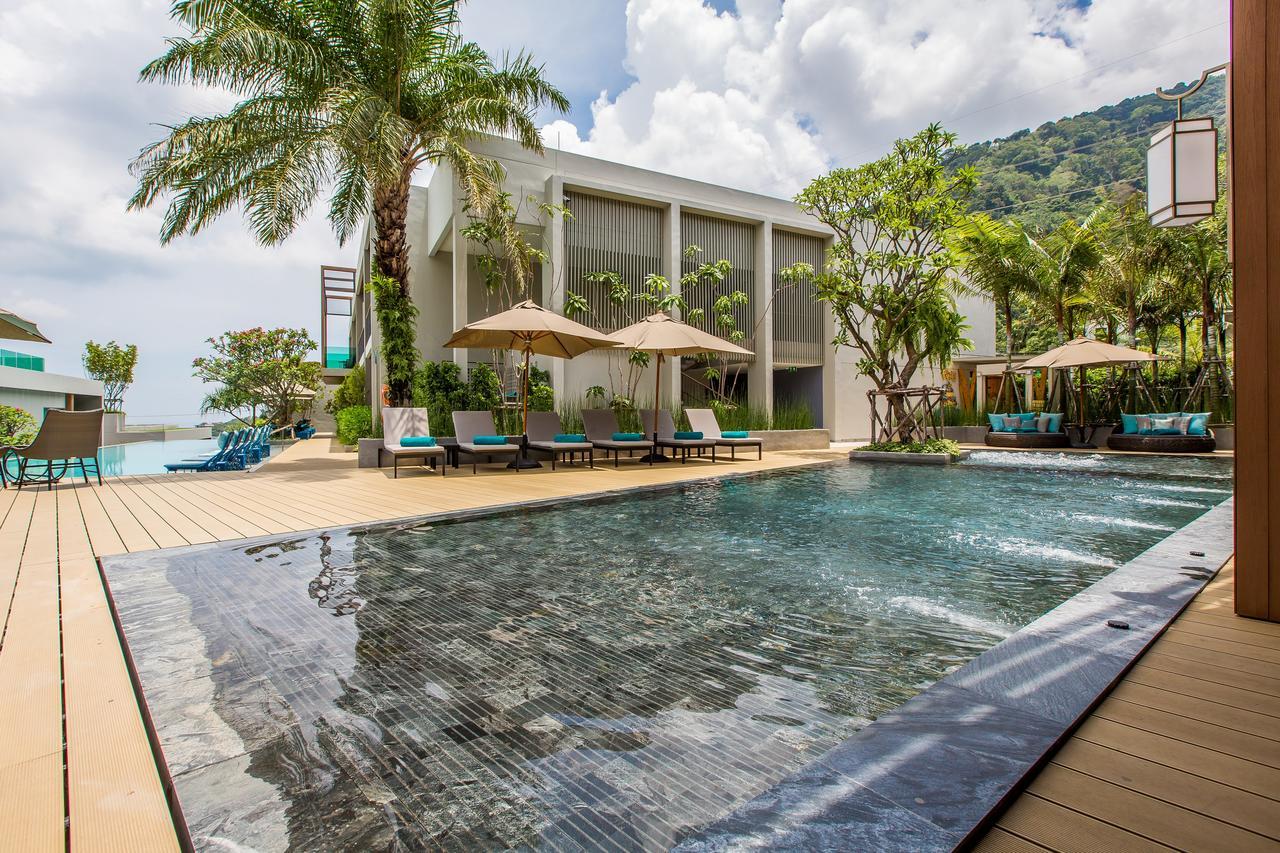 Fusion Suites Phuket Patong Luaran gambar The swimming pool at the hotel