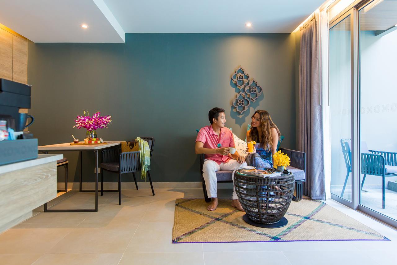 Fusion Suites Phuket Patong Luaran gambar A living room at the hotel